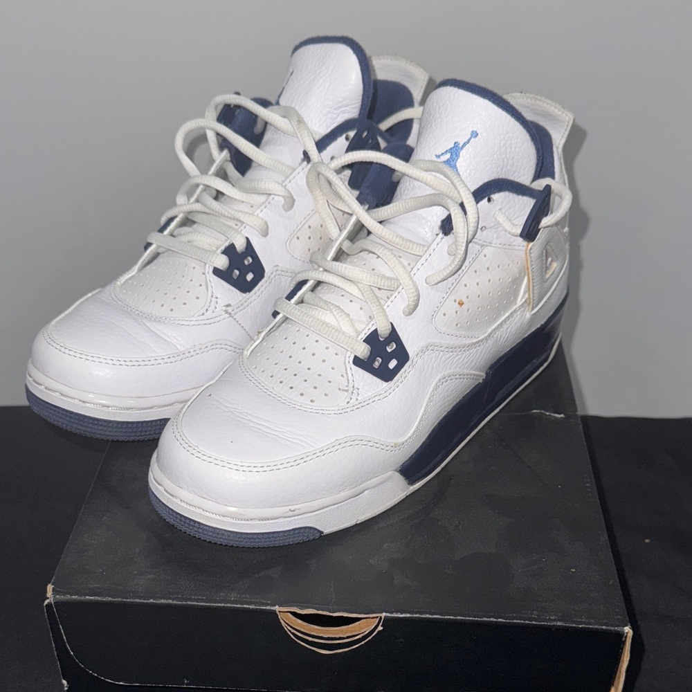 Air Jordan 4 Retro White and Navy Sneakers